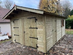 Garage en ossature bois, Toiture deux pentes, bardage Pin sylvestre autoclave